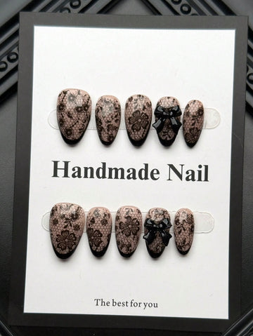 Y2K Short Almond Handmade Press On Nails,Black French-Style Design Accented With A Bow-Perfect For Women To Wear On Both Everyday Occasions And Holidays.